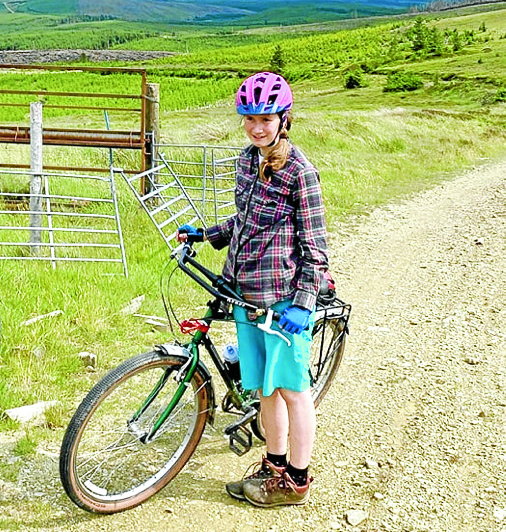 Youngster in charity cycle ride for farm