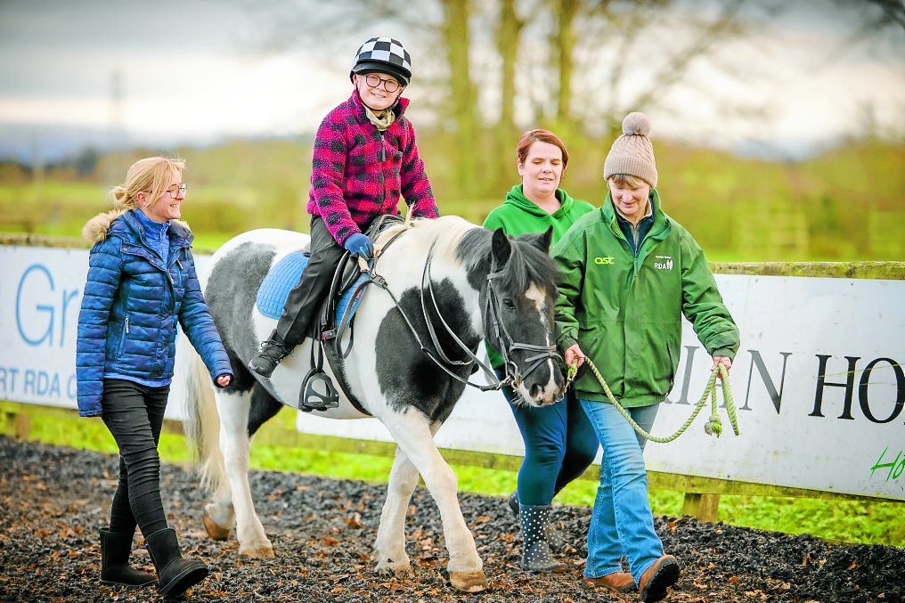 Josh welcomes riding school grant