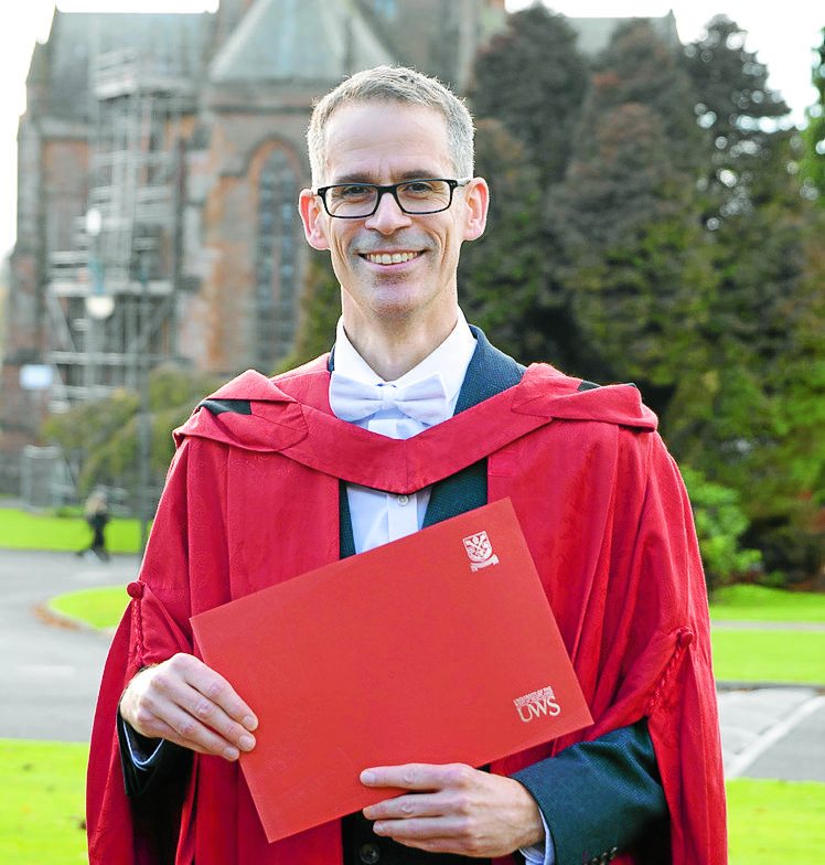 Oxfam boss honoured at university graduation