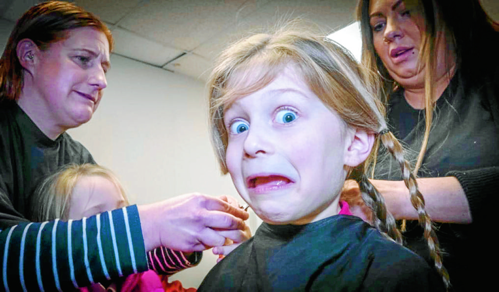 Kind-hearted Logan in charity hair chop