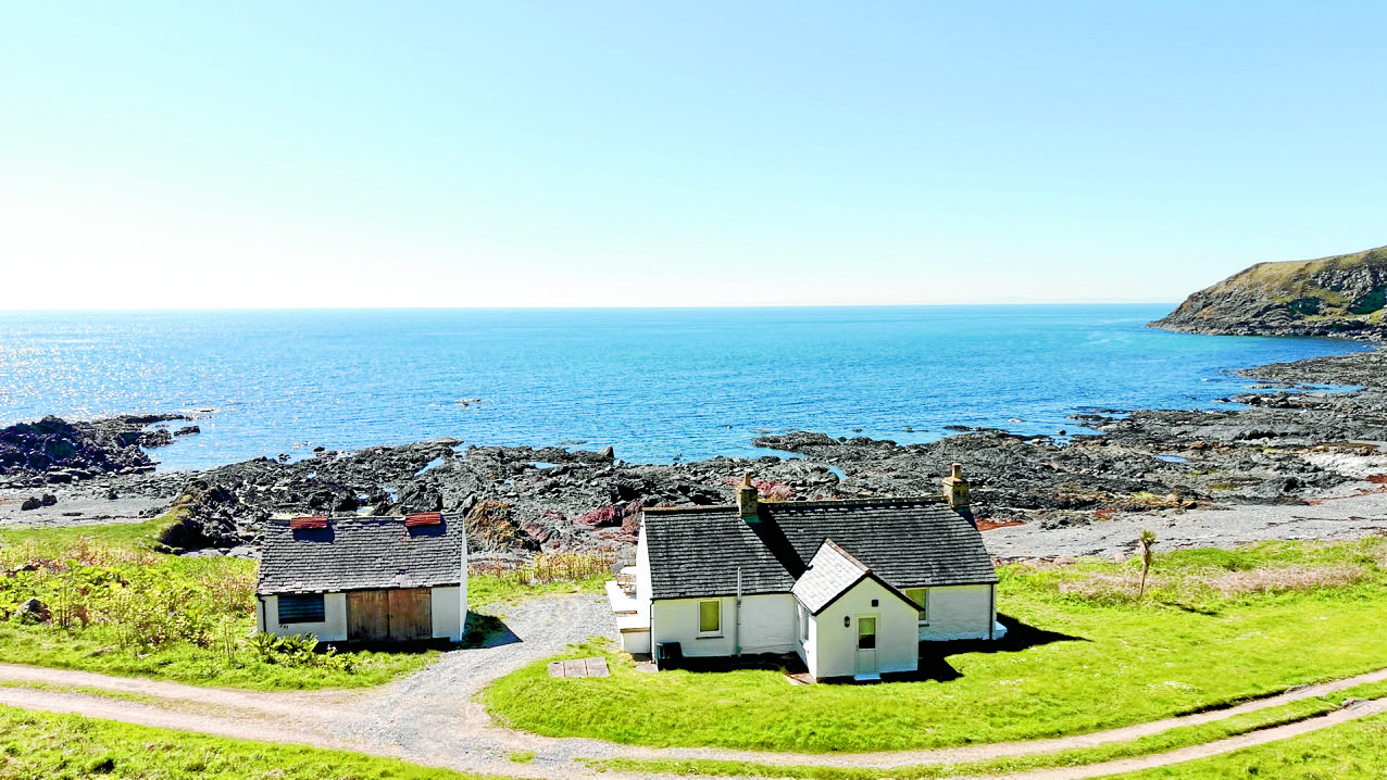 Chance to own a private bay and cottages
