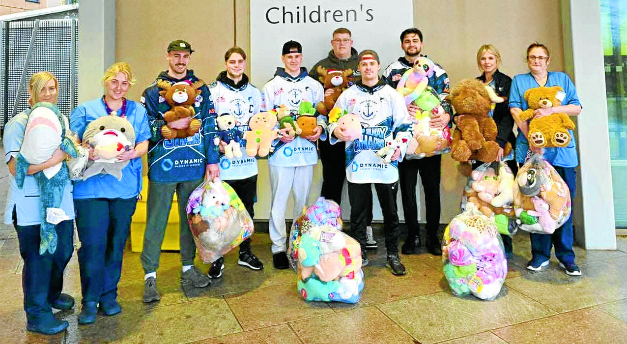 Soft toy donation from ice hockey side