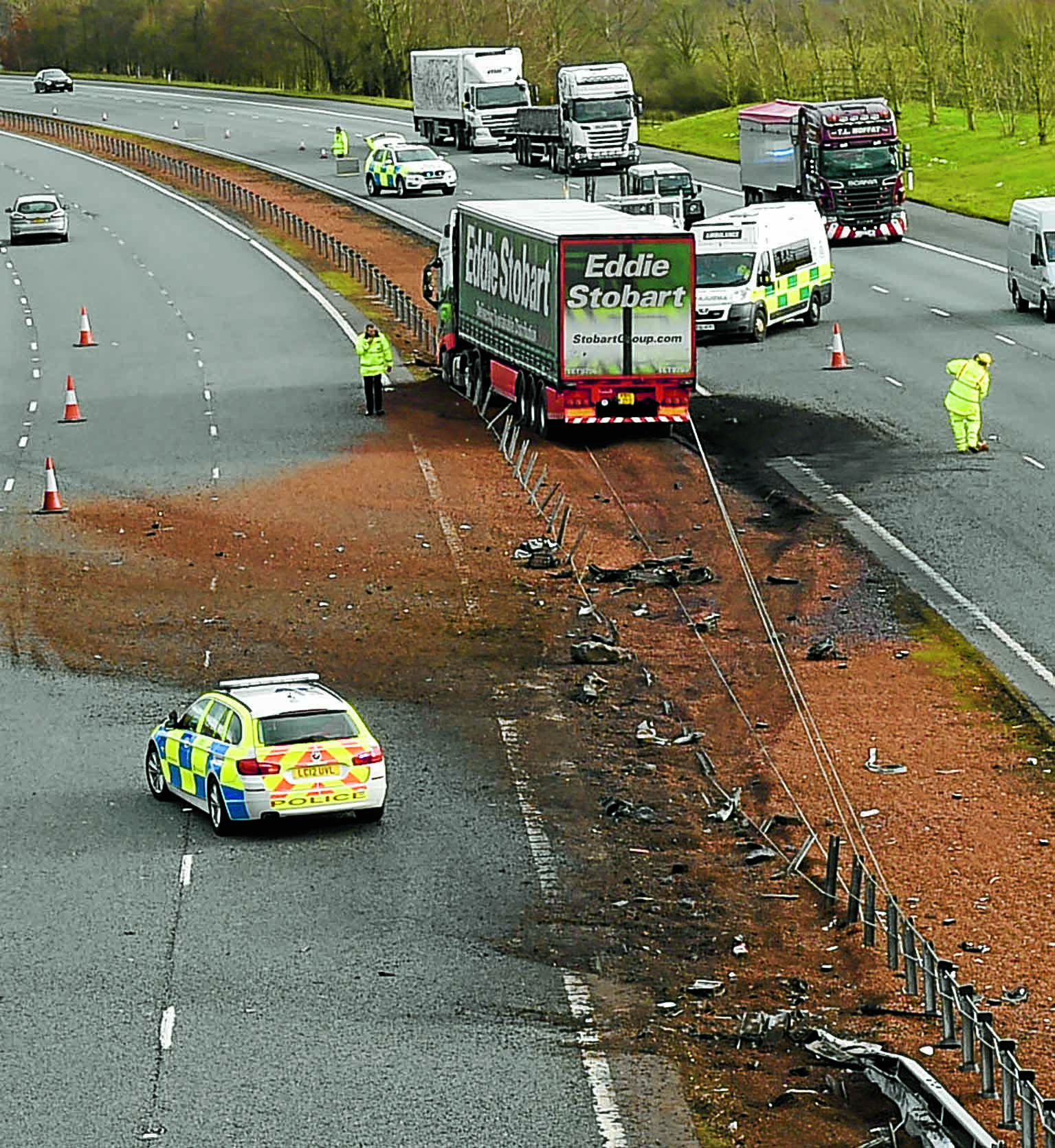 Lorry crashes through M-way barrier