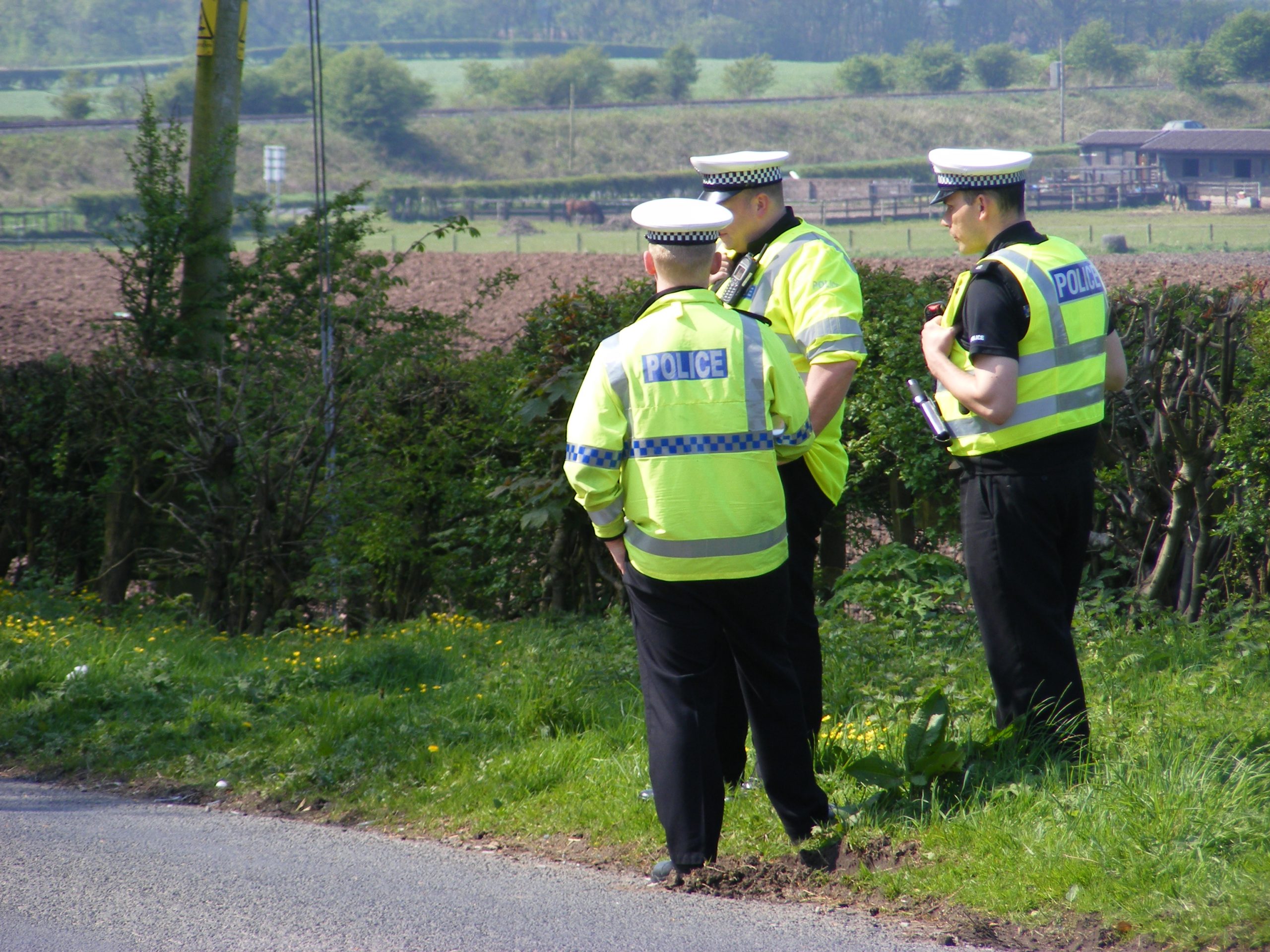 Two hurt in trike and car crash