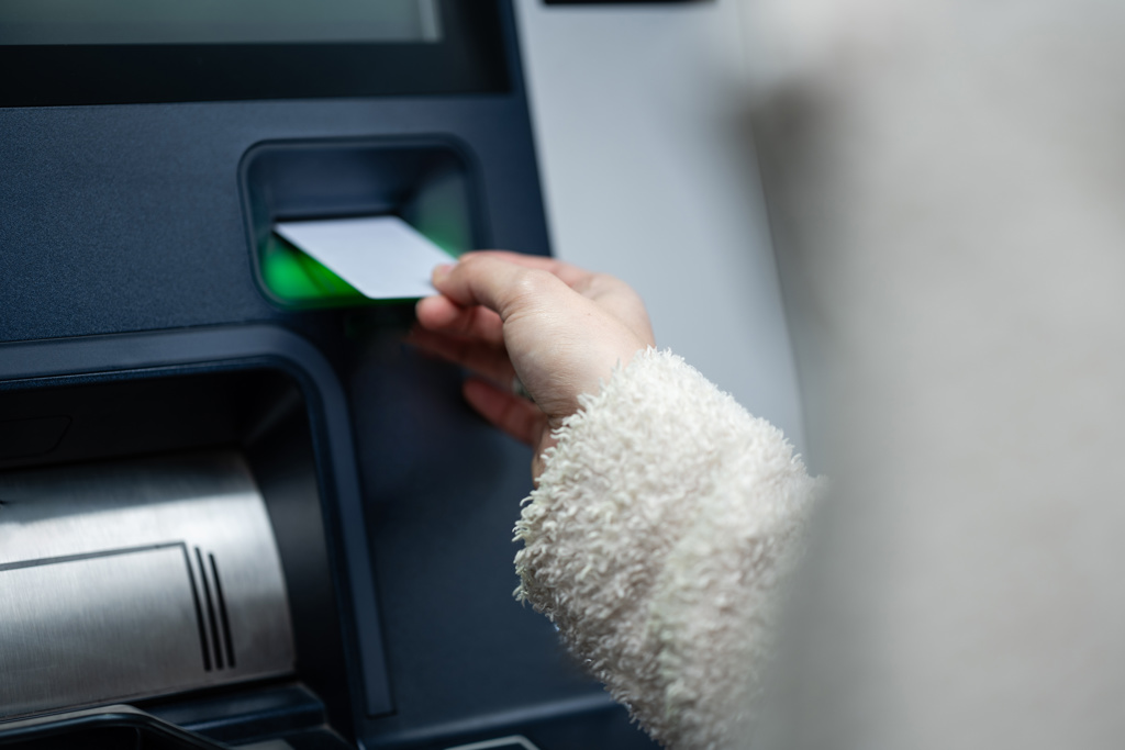 Woman stole card and withdrew nearly £3k