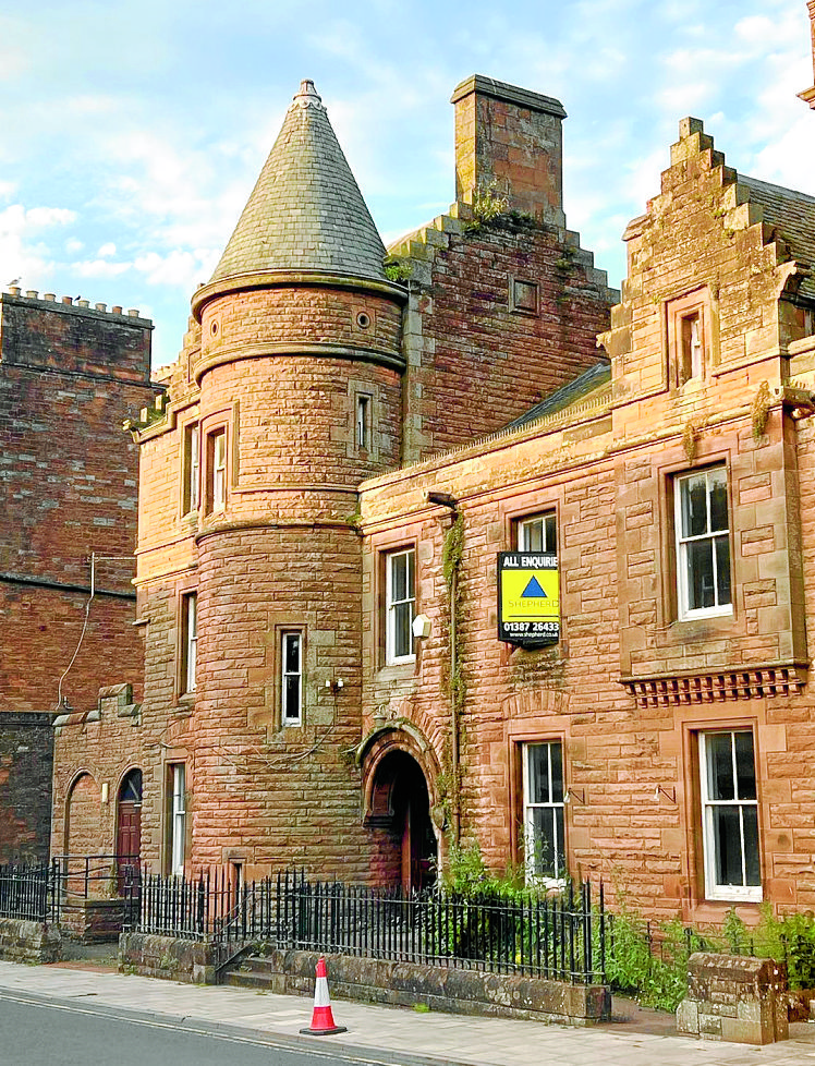 Town centre building sells ?at auction