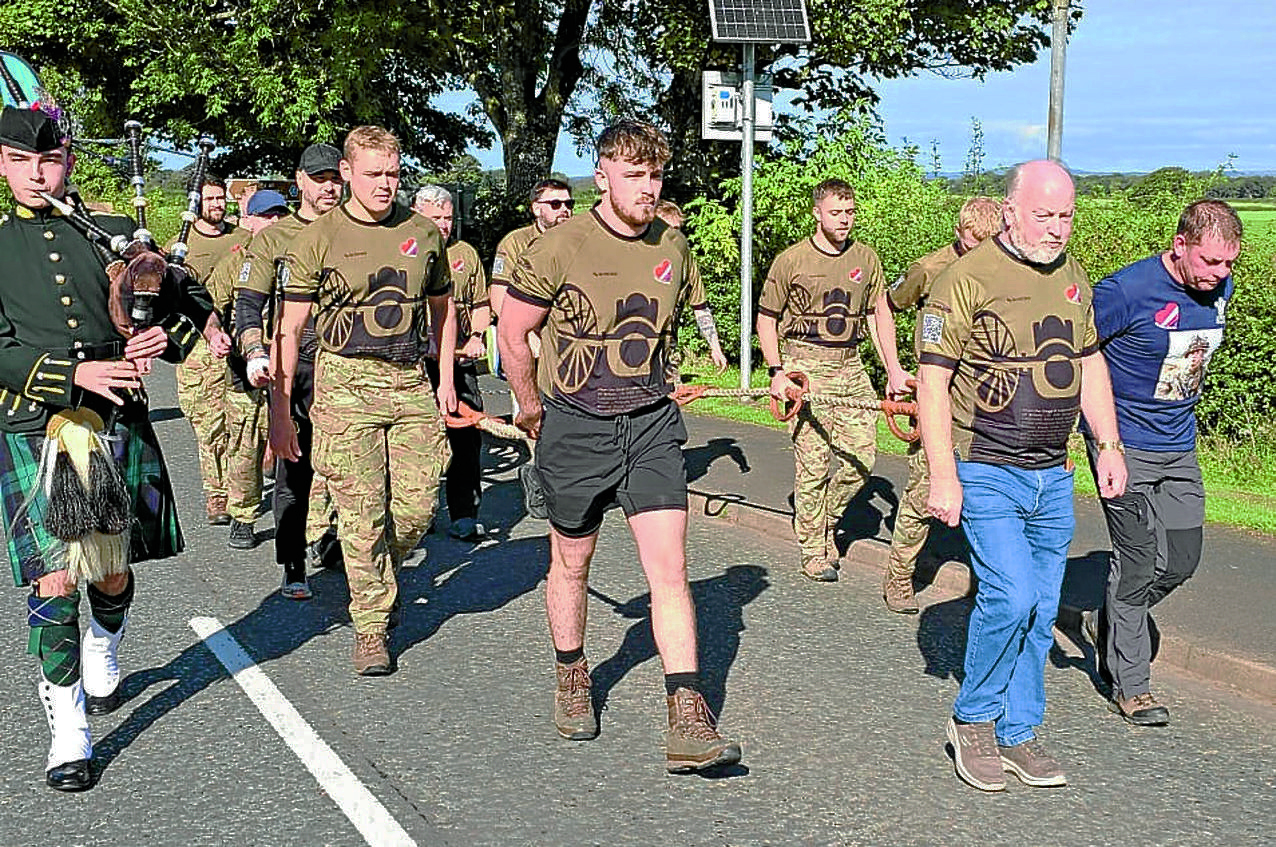 Gun pull team pass through Annandale