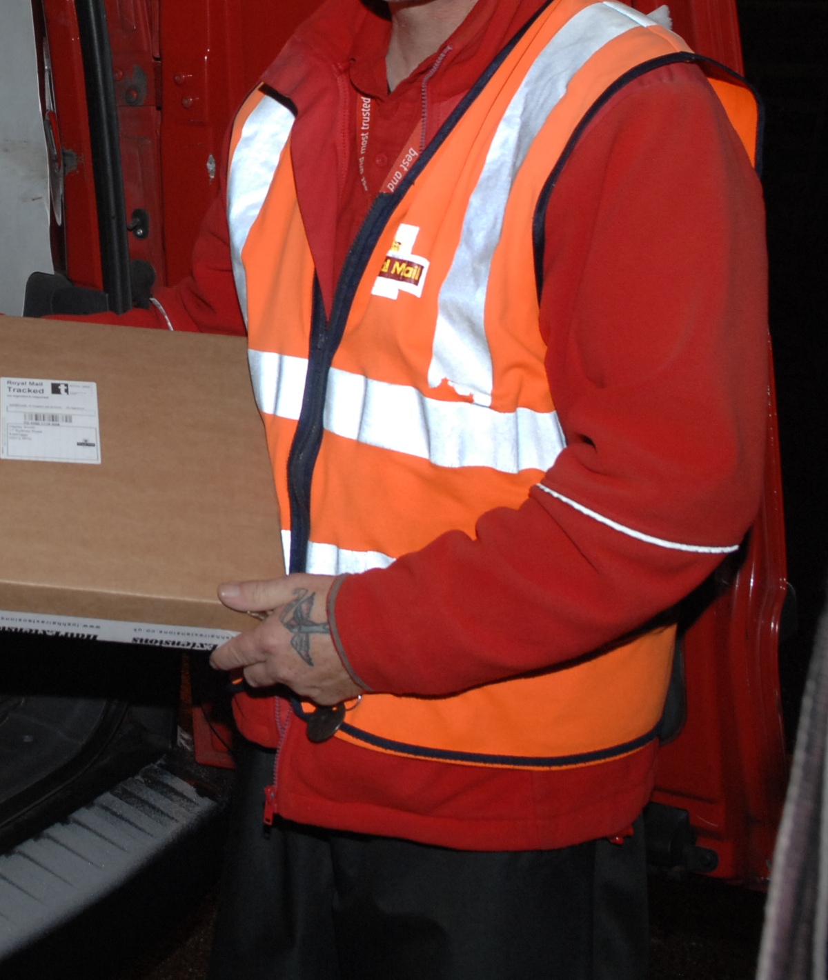 Postman attack sparks police hunt