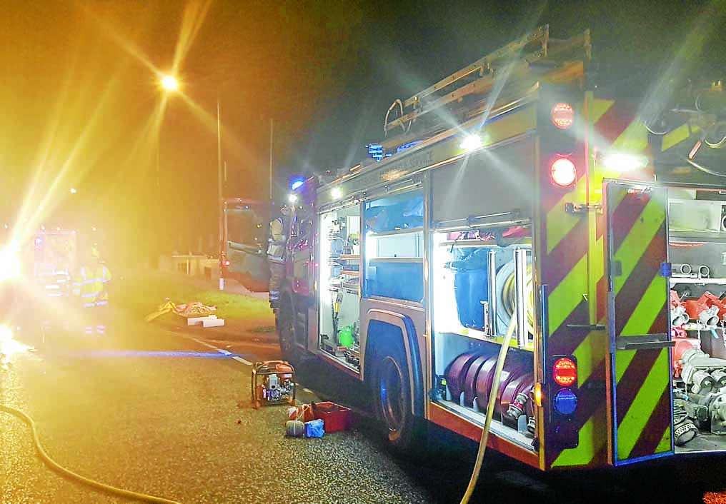 Woman trapped after crash