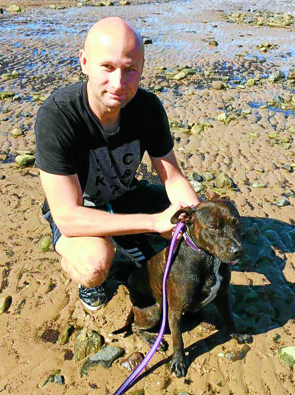 'Hero' landlord saves dog in sea drama